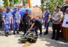 TNI-Polri Melaksanakan Kerja Bakti di Gunungkidul ( Foto : Pemkab Gunungkidul )