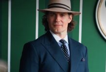 Gaya Klasik Henry Cavill dan Kekasih di Wimbledon 2025 Henry Cavill mengenakan setelan Ralph Lauren saat menghadiri Wimbledon 2025 di Wimbledon, London, Inggris, pada Minggu (13/7/2025).(Dok. Instagram @ralphlauren)