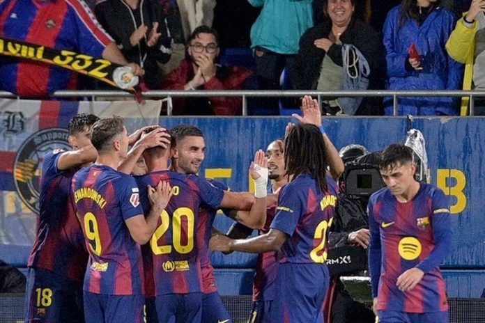 Barcelona meraih kemenangan meyakinkan 3-0 atas Getafe dalam lanjutan Liga Spanyol, Minggu (21/9/2025). Ferran Torres menjadi bintang dengan mencetak dua gol, sementara Dani Olmo turut menyumbang satu gol bagi tim asuhan Hansi Flick.(AFP/MANAURE QUINTERO)