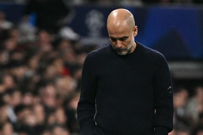 Pelatih Manchester City, Pep Guardiola, tidak berkelit banyak usai kekalahan 1-3 timnya dari Real Madrid pada Rabu (19/2/2025) atau Kamis dini hari WIB.(AFP/JAVIER SORIANO)